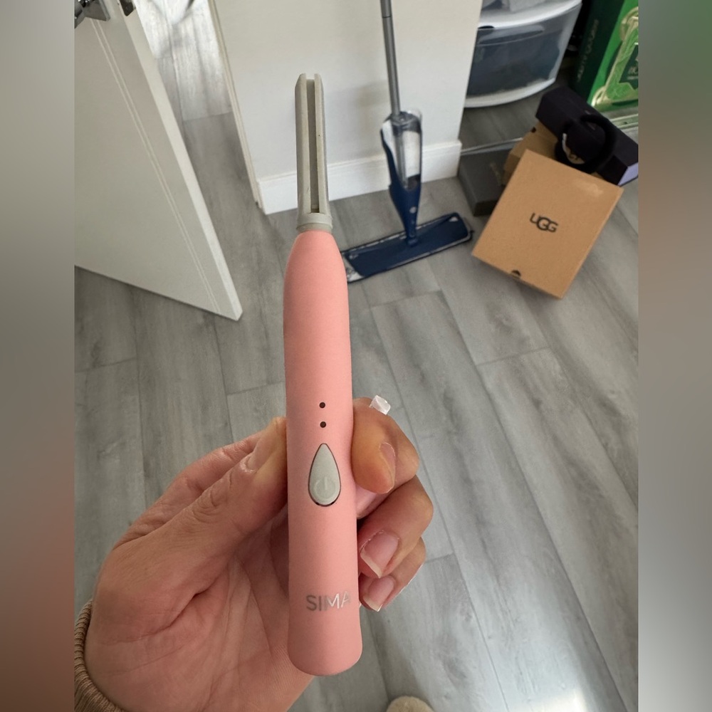 Sima sonic dermaplaning device